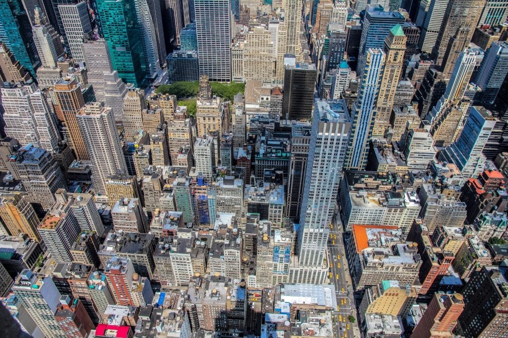 Aerial view of a crowded city skyline representing daily environmental background noise